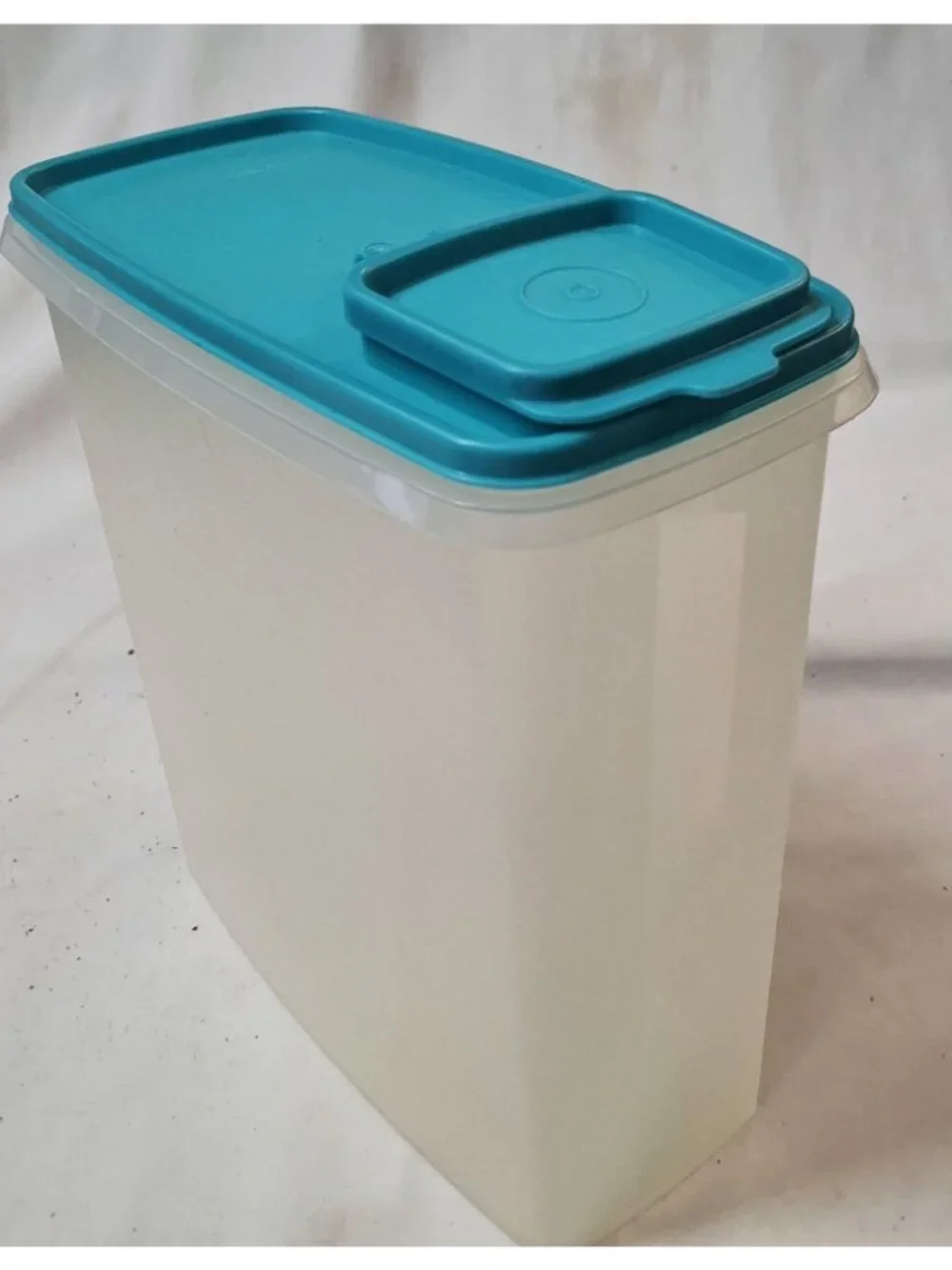 Vintage Tupperware 20-cup super cereal keeper in sheer white with an Aqua Blue l